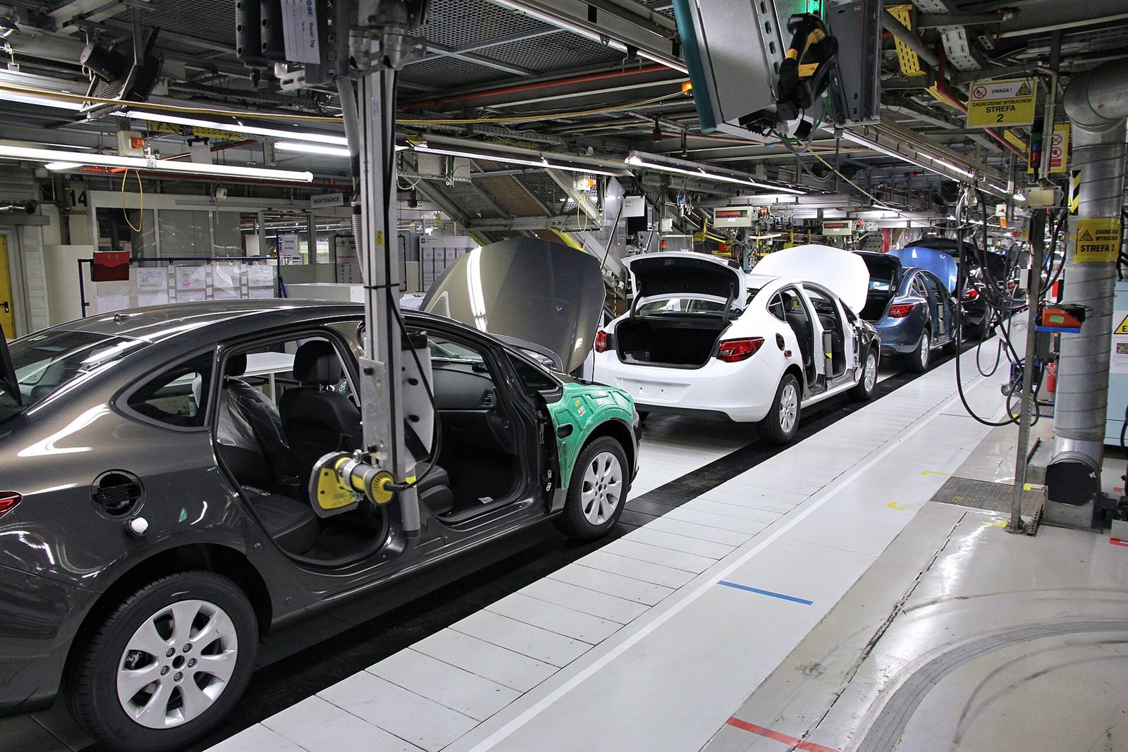 Cars on an automotive assembly line